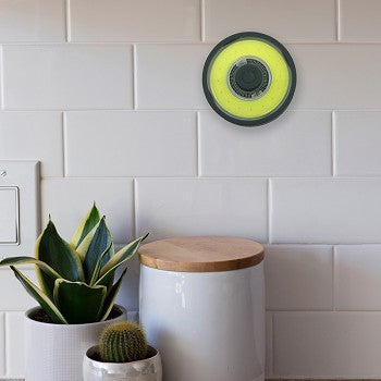 Stuck! COB LED Work Light with suction cup mount, showcasing its compact design and bright illumination features.