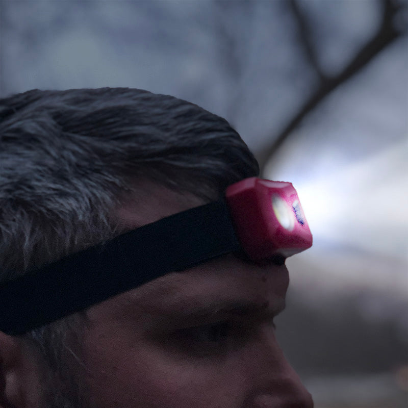 Vega 200 COB LED Ultralight 3-Pack Headlamps in red, orange, and green colors, showcasing their compact design and adjustable headband.