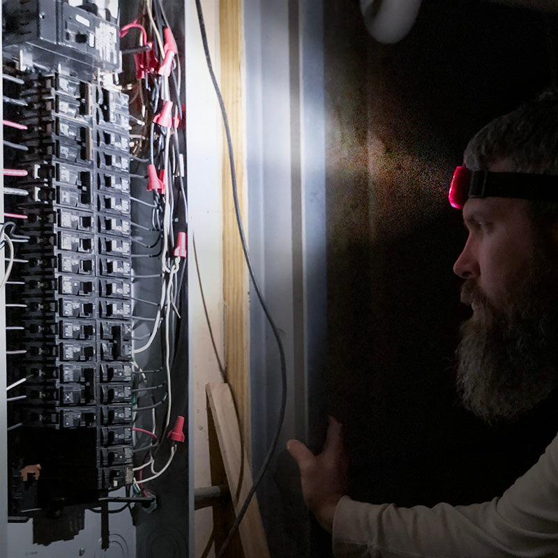 Vega 200 COB LED Ultralight 3-Pack Headlamps in red, orange, and green colors, showcasing their compact design and adjustable headband.