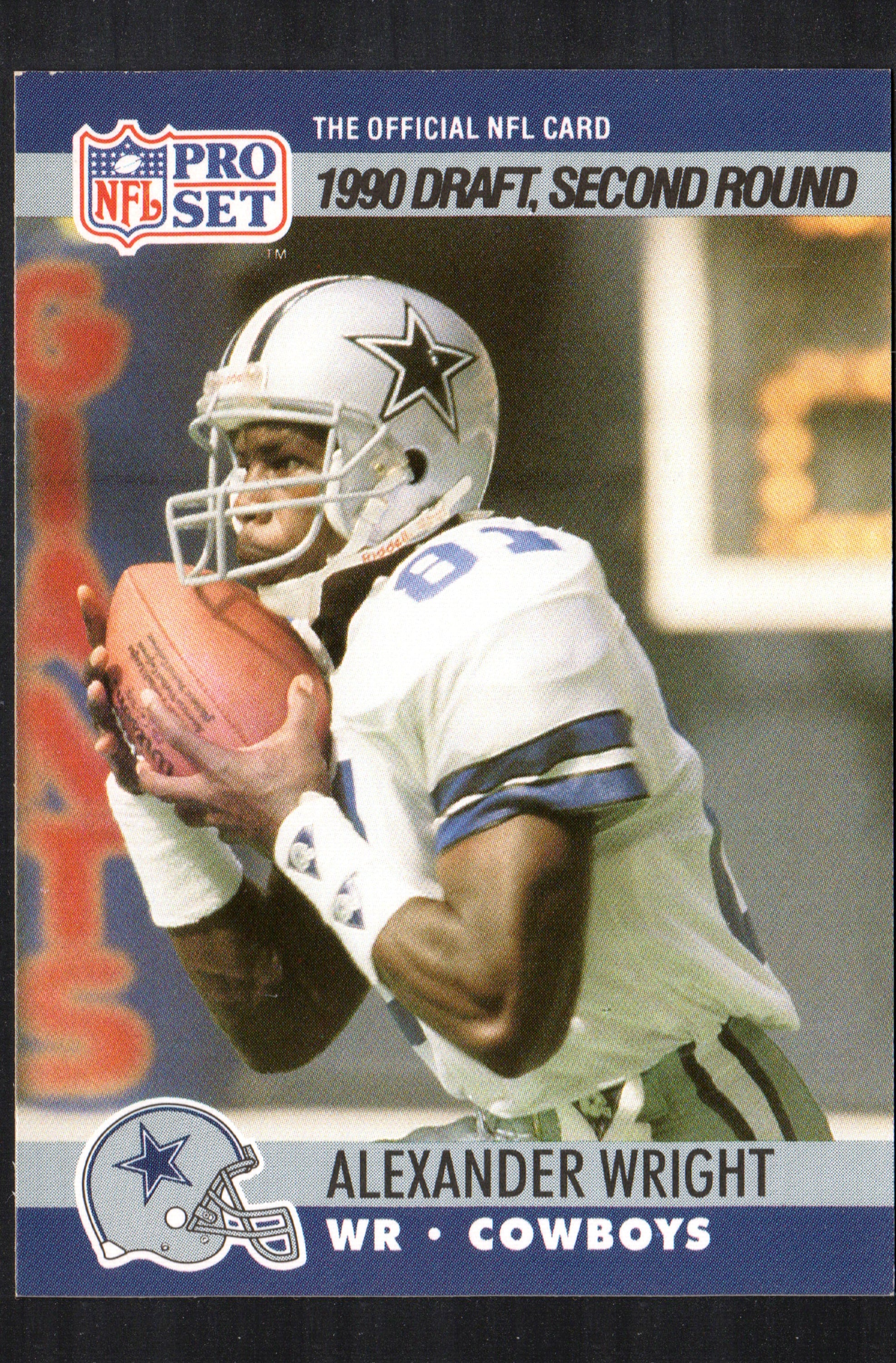 Alexander Wright Dallas Cowboys #695 trading card from 1990 Pro Set, featuring rookie player with slight edge whitening.