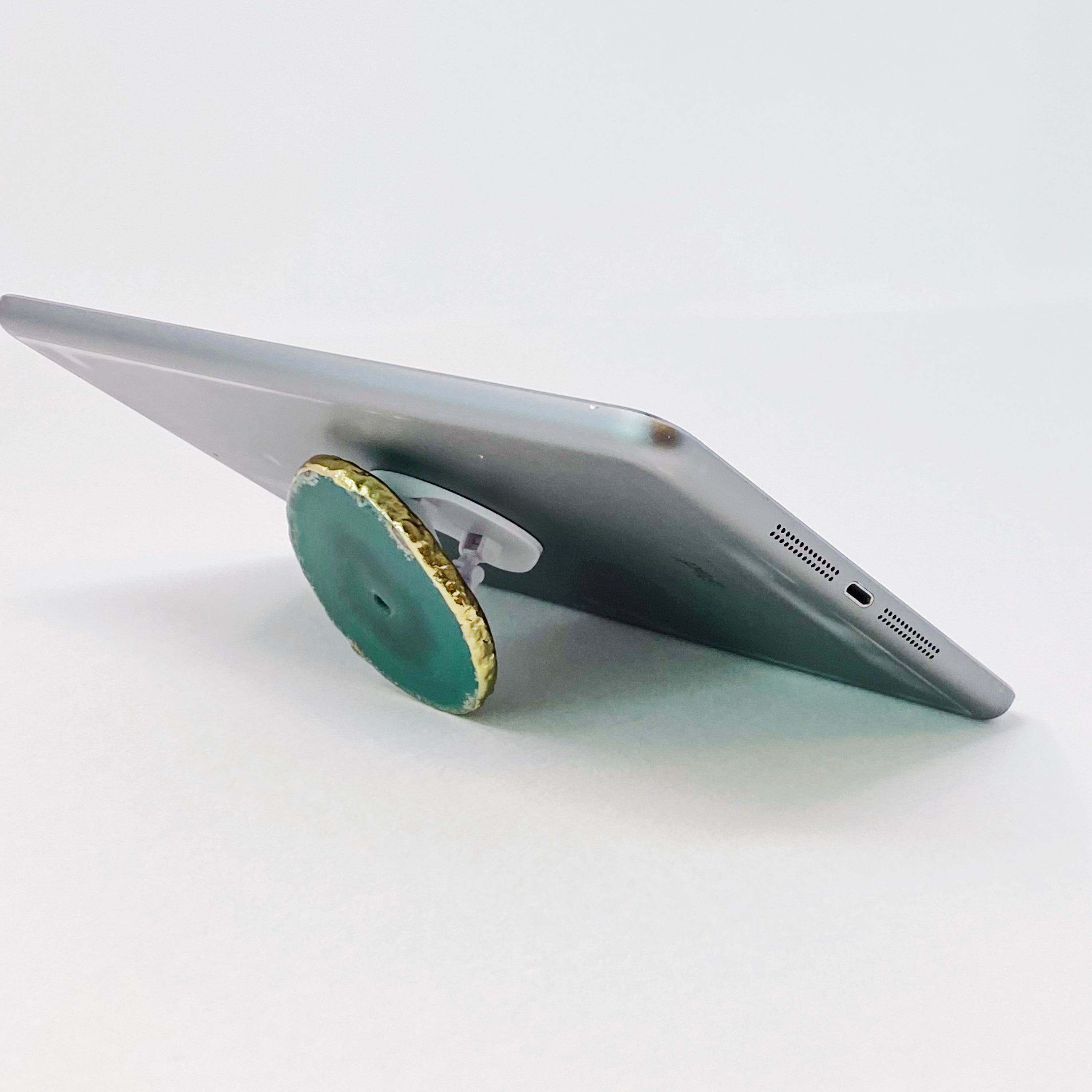 Golden Edge Natural Stone Device Grip featuring a unique natural stone slice with a golden trim, designed for mobile phones and tablets.