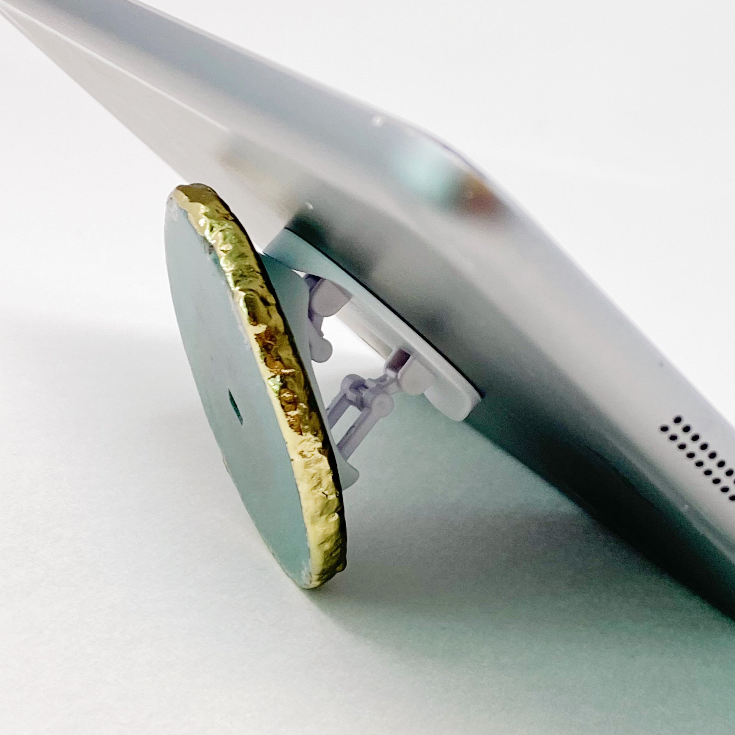 Golden Edge Natural Stone Device Grip featuring a unique natural stone slice with a golden trim, designed for mobile phones and tablets.