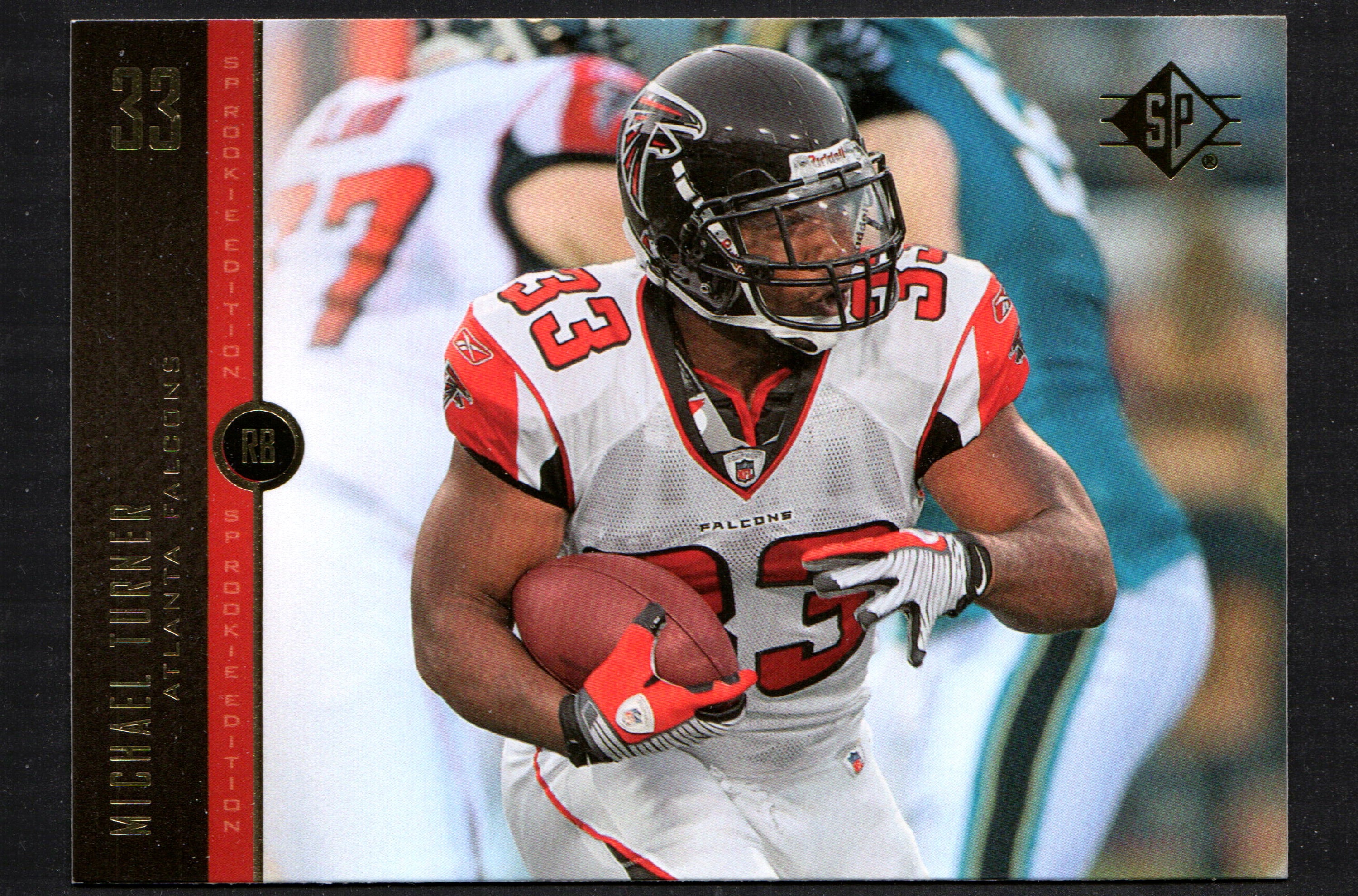 Michael Turner Atlanta Falcons #76 trading card from 2008 SP Rookie Edition, featuring vibrant colors and detailed design.
