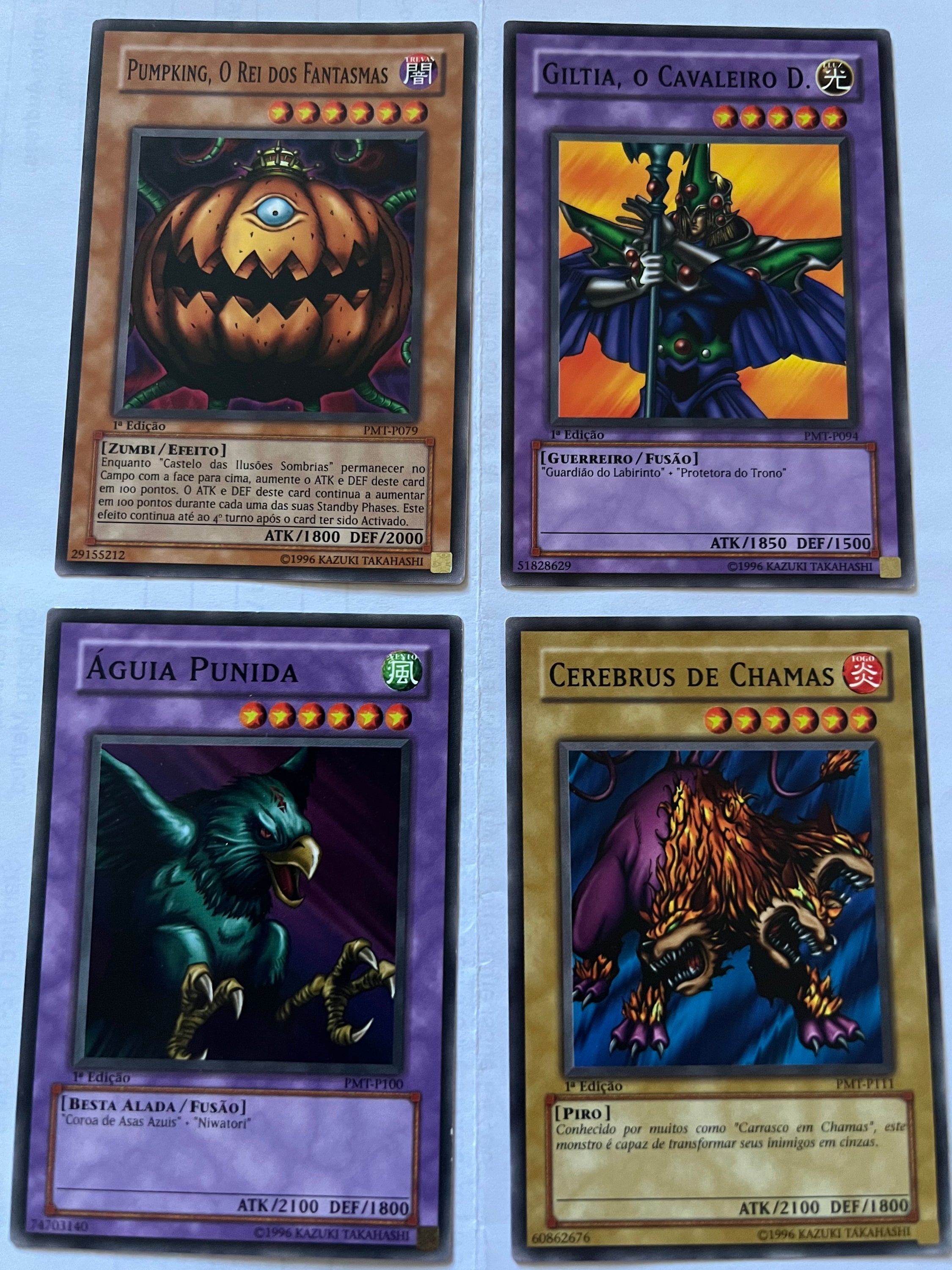 A collection of 9 Portuguese Yu-Gi-Oh! Metal Raiders cards from the Ancient Sanctuary set, showcasing unique designs and characters.