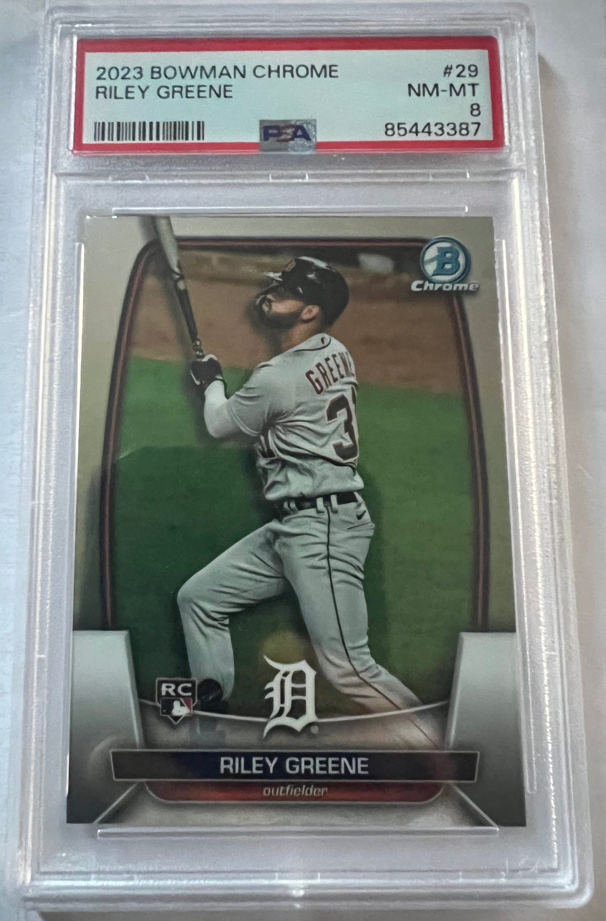 Riley Greene Detroit Tigers #29 trading card from 2023 Bowman Chrome, rated PSA 8, showcasing vibrant colors and player details.