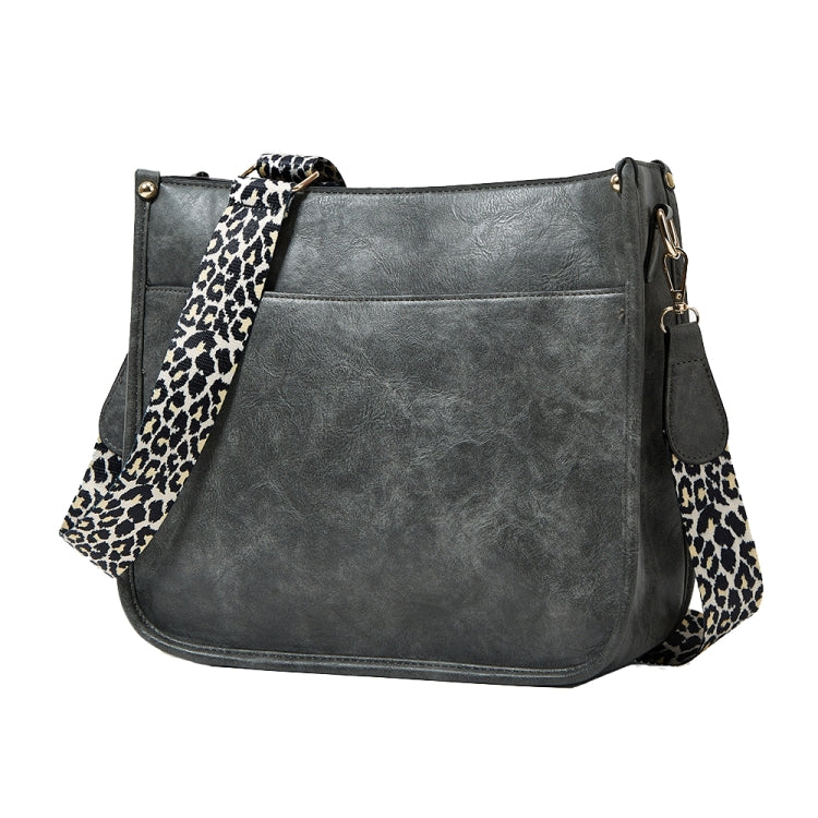 013 Leopard Strap PU Leather Single-shoulder Waterproof Crossbody Tote showcasing its stylish design and adjustable strap.
