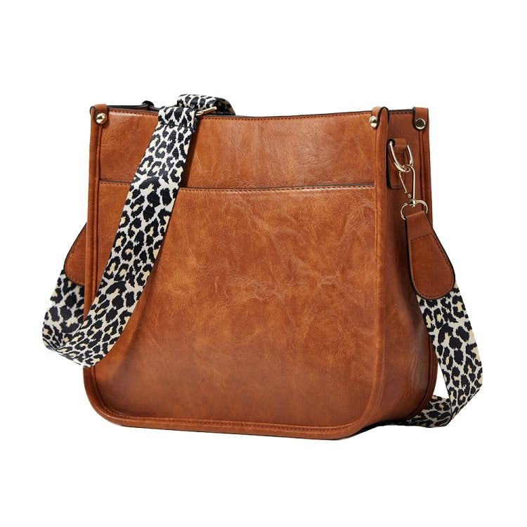 013 Leopard Strap PU Leather Crossbody Tote showcasing stylish leopard print and adjustable strap.