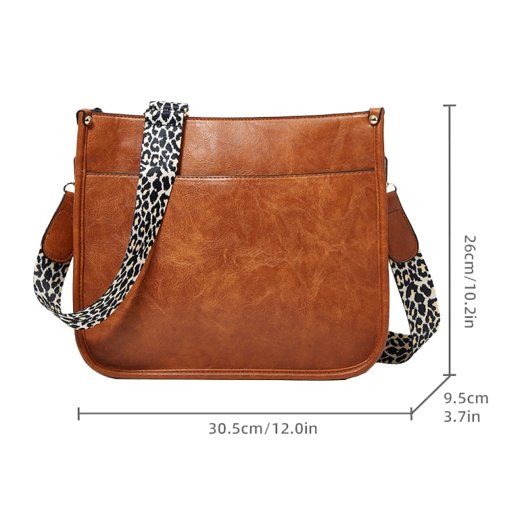 013 Leopard Strap PU Leather Crossbody Tote showcasing stylish leopard print and adjustable strap.