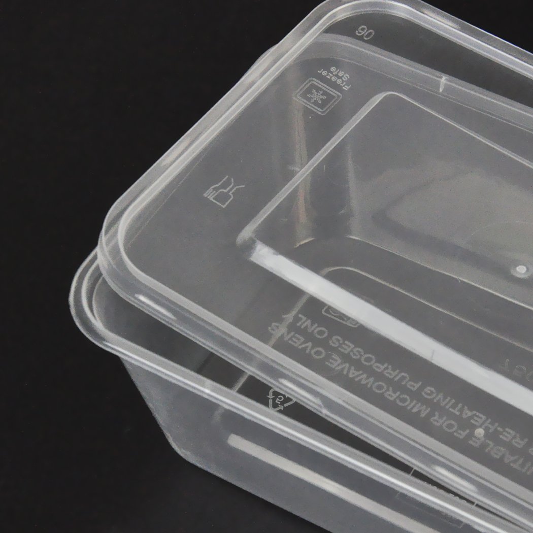 A stack of 100 Pcs 1000ml Take Away Food Plastic Containers with lids, ideal for storing and transporting food securely.