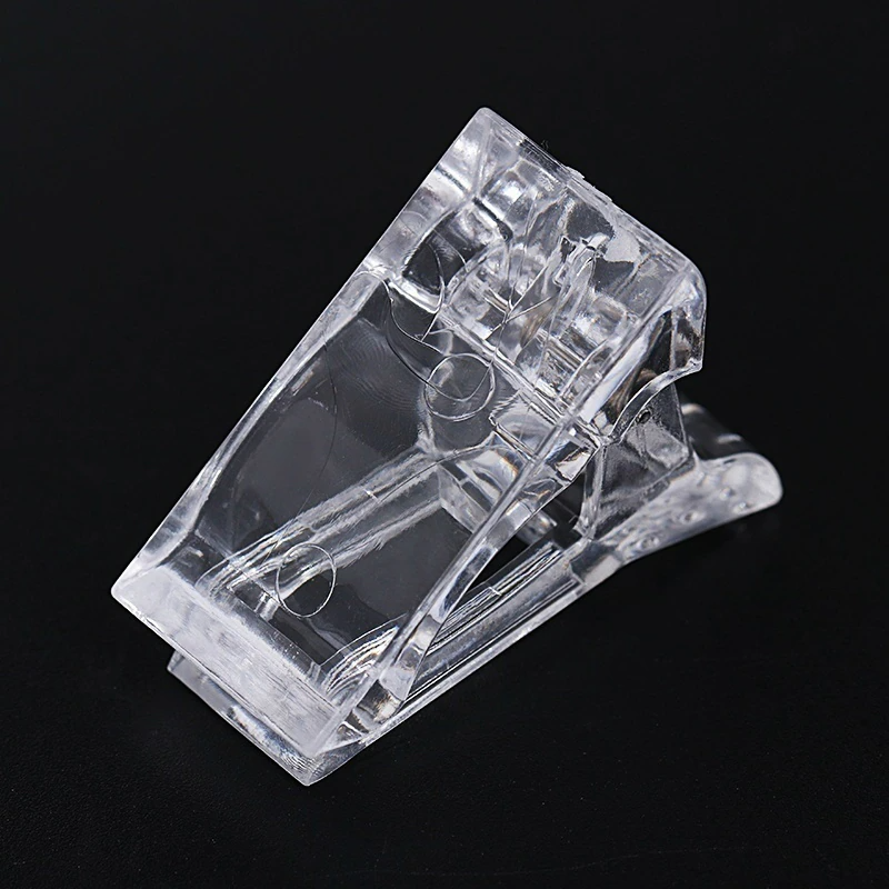 A set of 10 transparent acrylic nail tips clips designed for quick building of poly builder gel extensions, showcasing ergonomic design and sturdy construction.