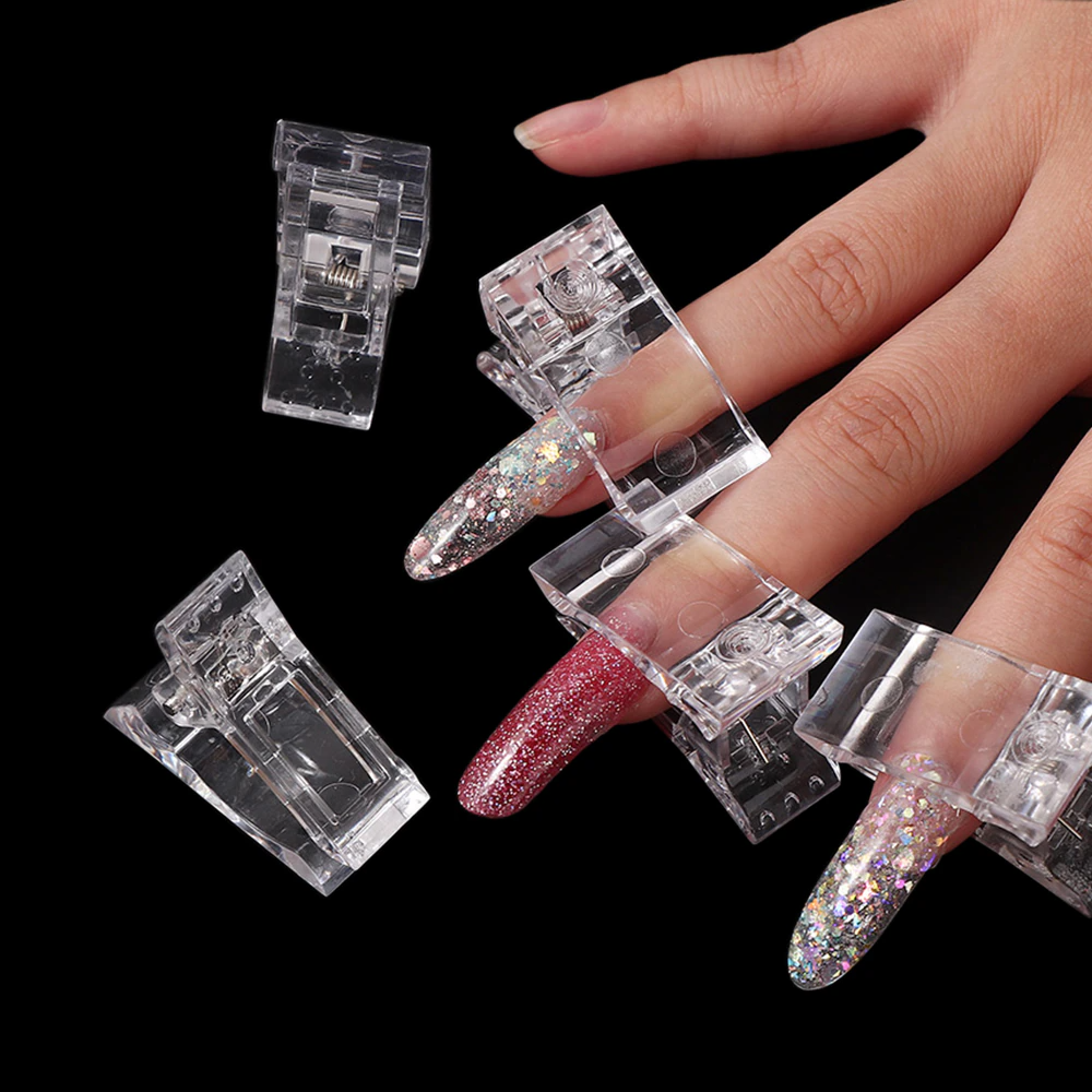 A set of 10 transparent acrylic nail tips clips designed for quick building of poly builder gel extensions, showcasing ergonomic design and sturdy construction.