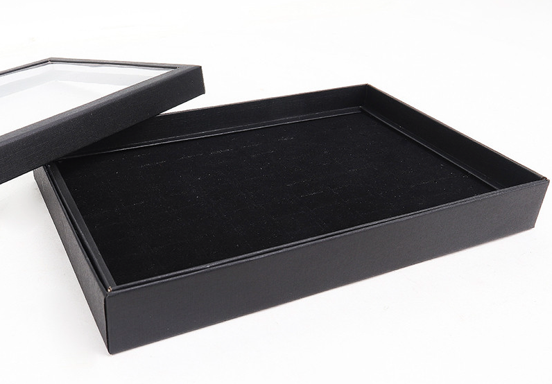 100 Slots Jewelry Ring Display Organizer Tray with transparent cover, showcasing rings and earrings in an elegant black design.