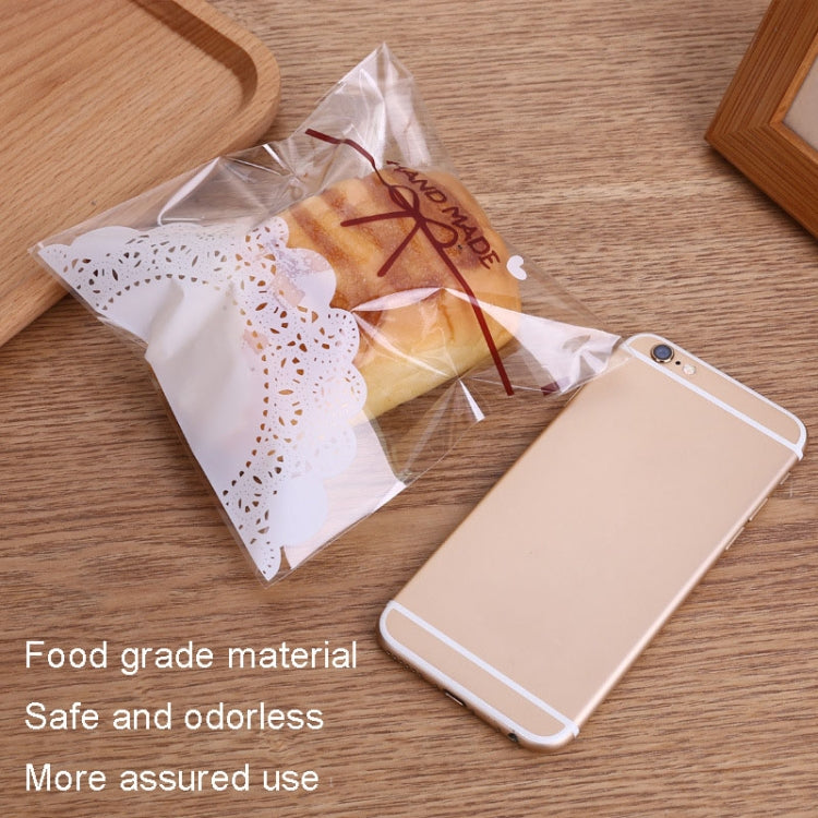 100pcs pack of 10x10cm white lace bow self-adhesive bags for baking, ideal for cookies and treats.