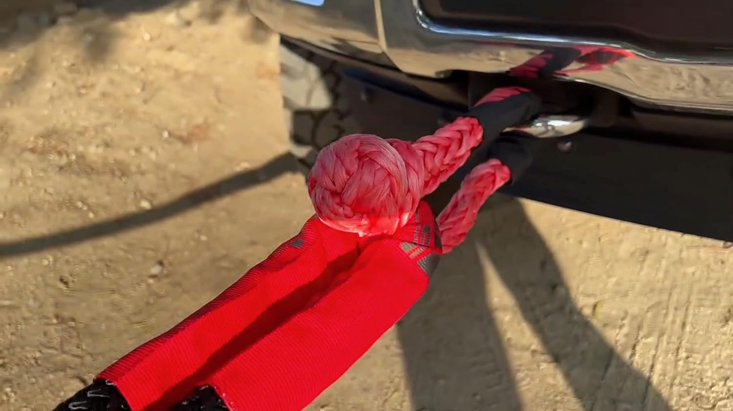 1/2 inch by 24 inch soft shackle recovery rope with 65,000 lbs breaking strength, designed for off-road SUV winching and towing.