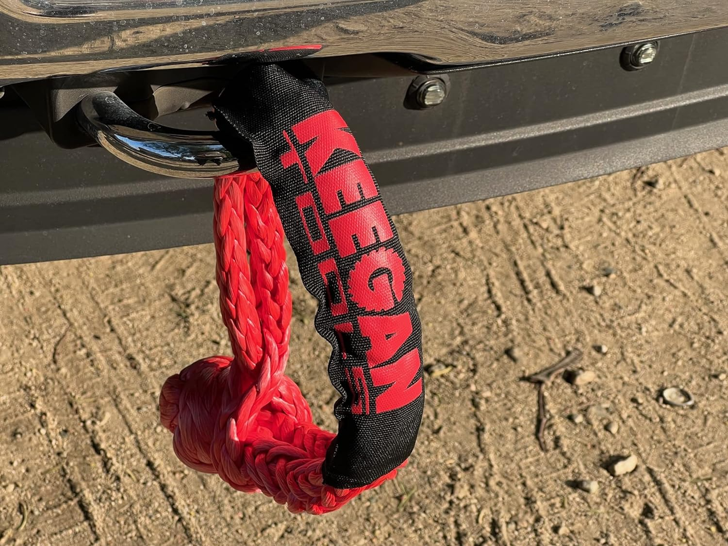 1/2 inch by 24 inch soft shackle recovery rope with 65,000 lbs breaking strength, designed for off-road SUV winching and towing.