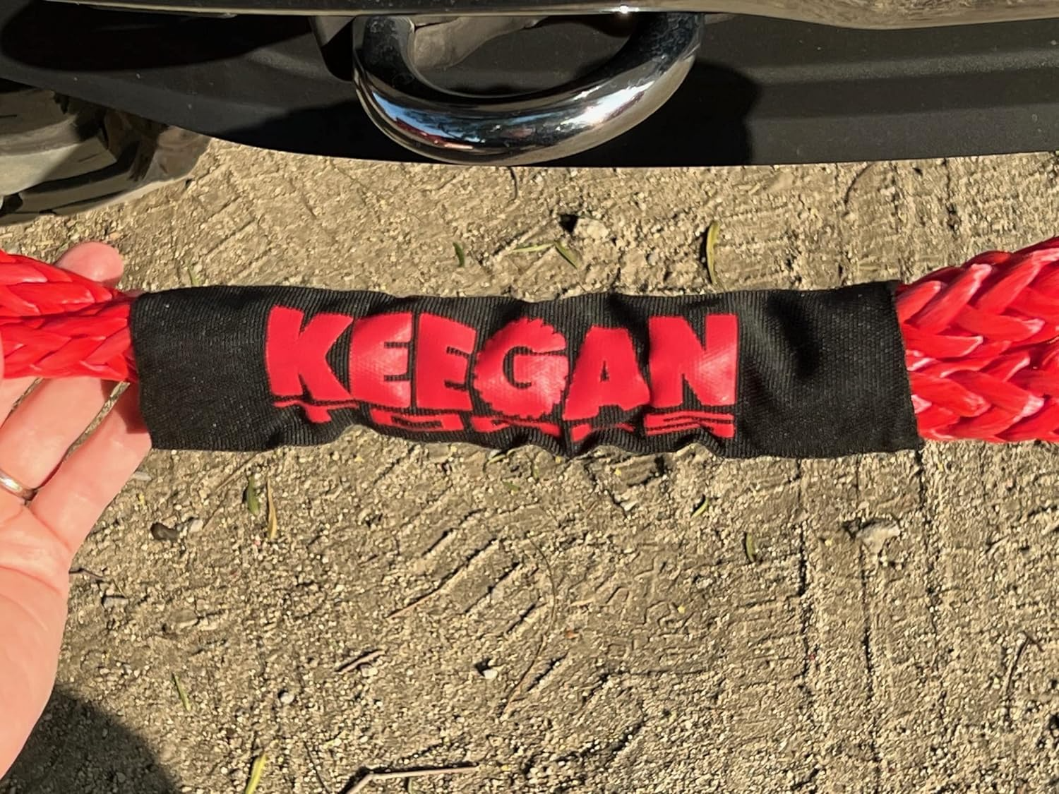 1/2 inch by 24 inch soft shackle recovery rope with 65,000 lbs breaking strength, designed for off-road SUV winching and towing.