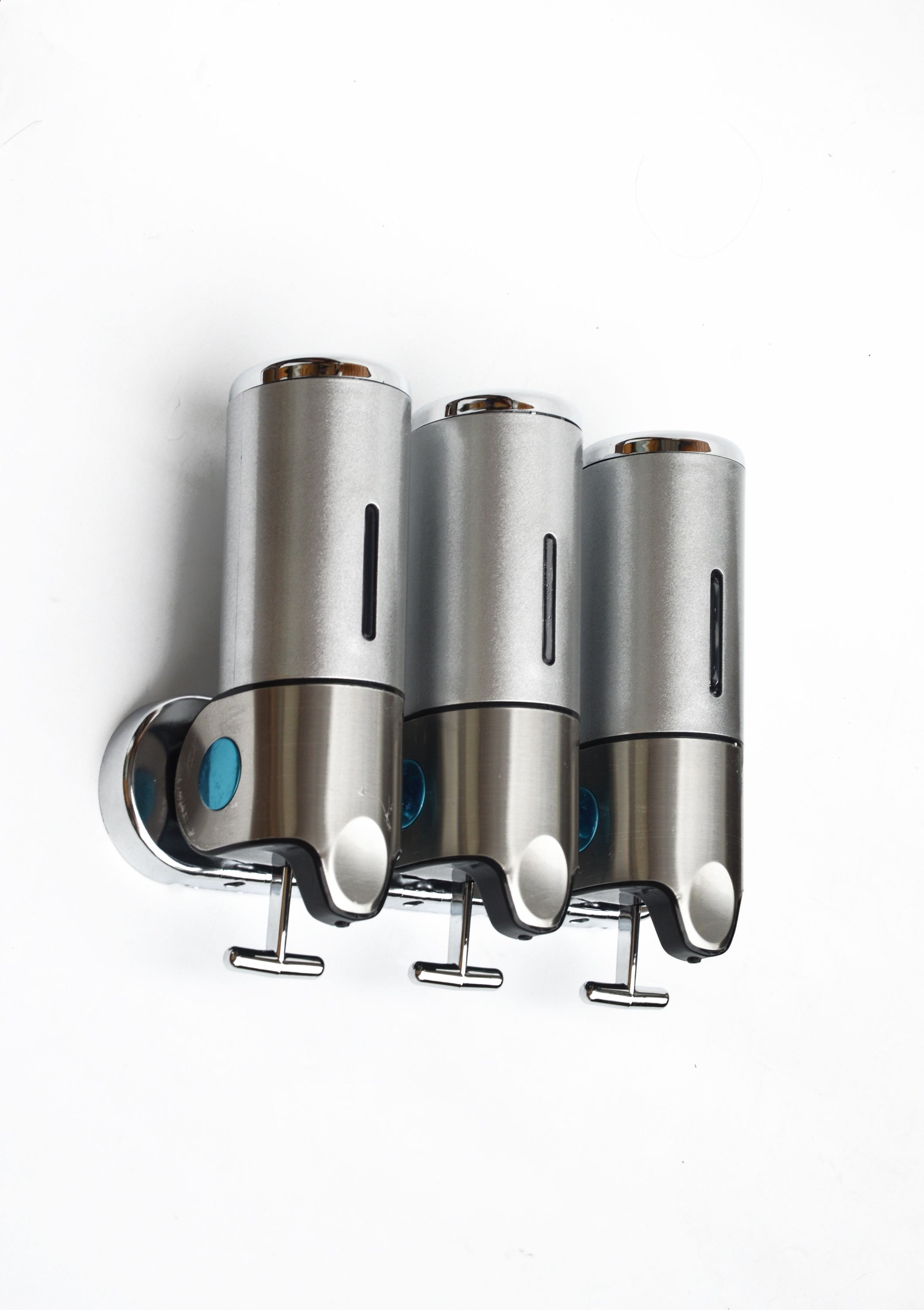 1500ml shower liquid soap dispenser with three canisters in sleek stainless steel design, mounted on a wall.