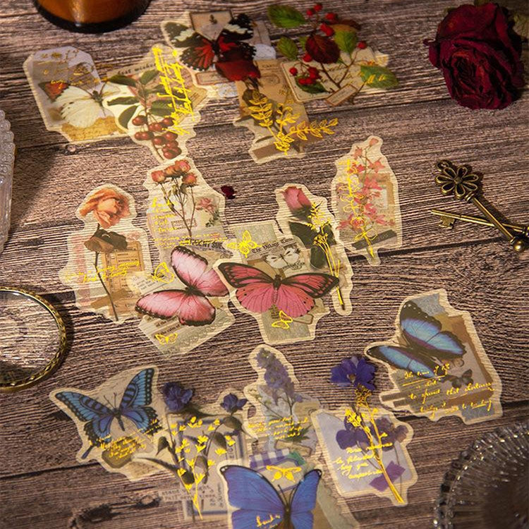 15 pieces of PET butterfly flower stickers in a pack, showcasing vibrant colors and intricate designs, perfect for DIY projects.