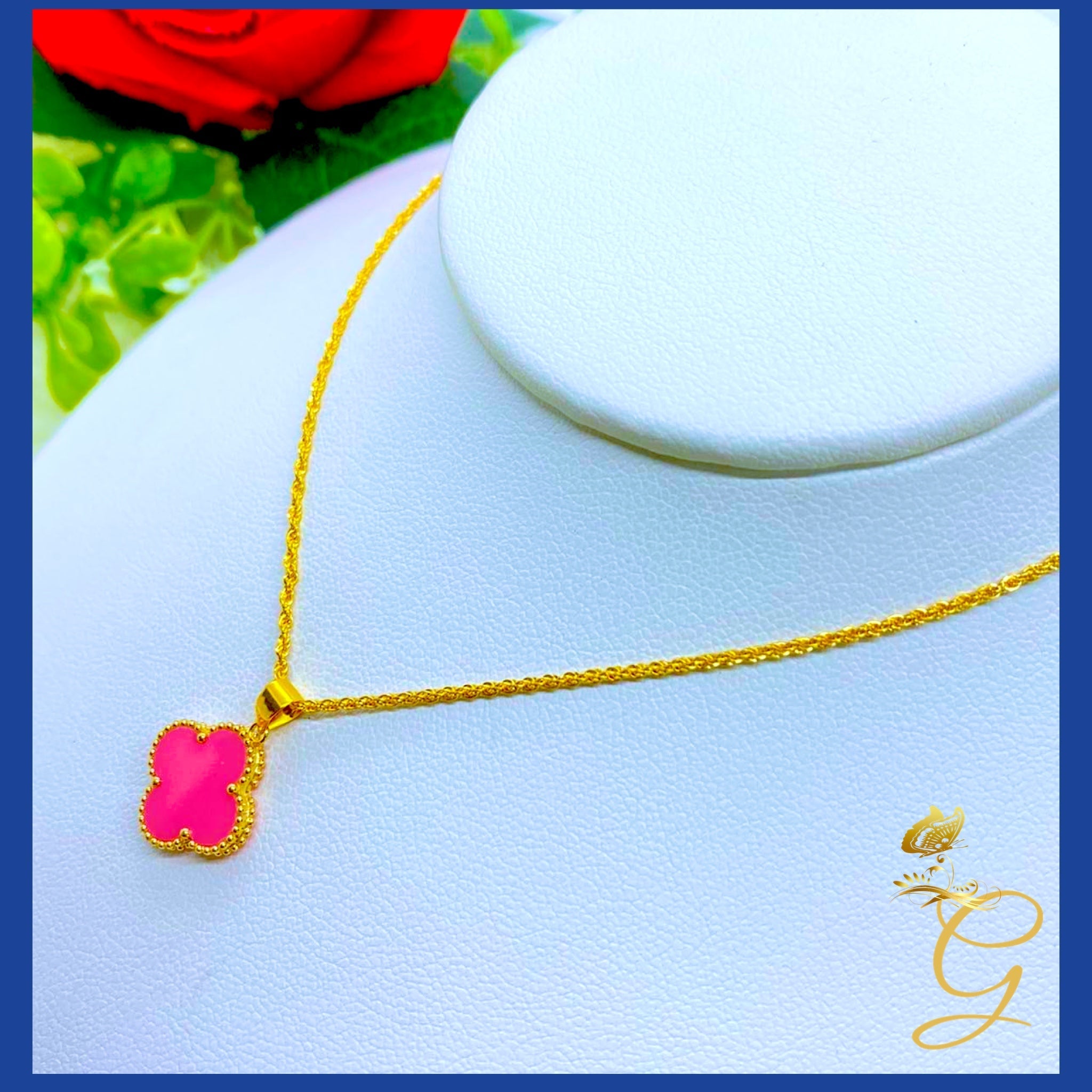 18K Real Gold 15mm Pink Cloverleaf Necklace displayed elegantly on a soft background, showcasing its intricate design and solid gold craftsmanship.