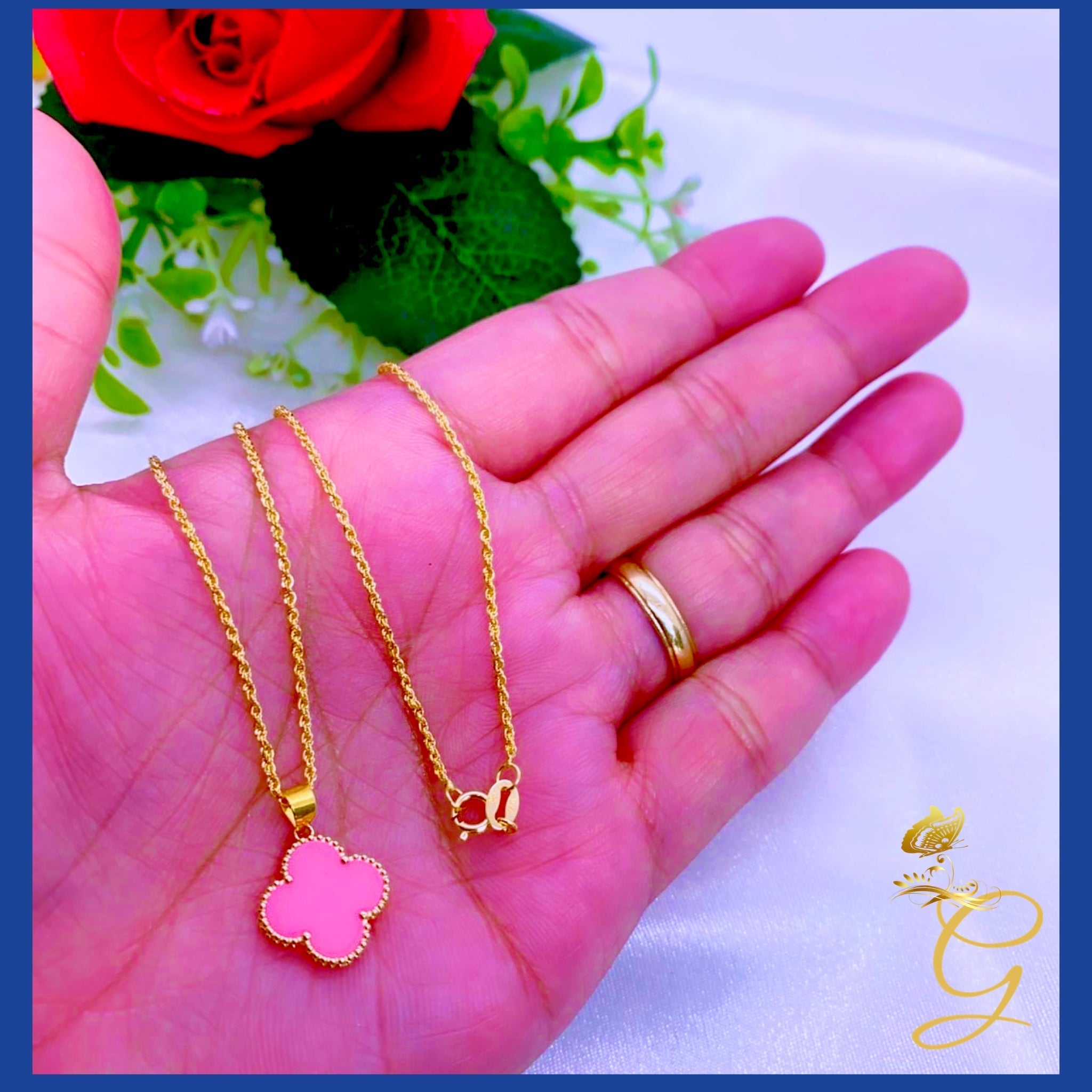 18K Real Gold 15mm Pink Cloverleaf Necklace displayed elegantly on a soft background, showcasing its intricate design and solid gold craftsmanship.