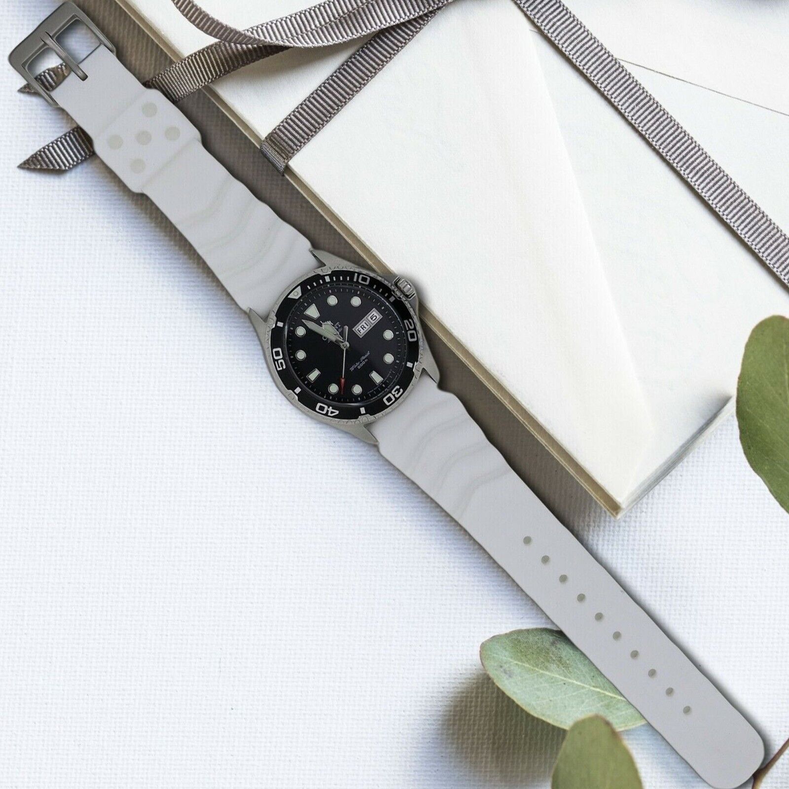 Soft silicone watch band available in multiple colors and sizes, designed for comfort and quick release for divers and watch enthusiasts.