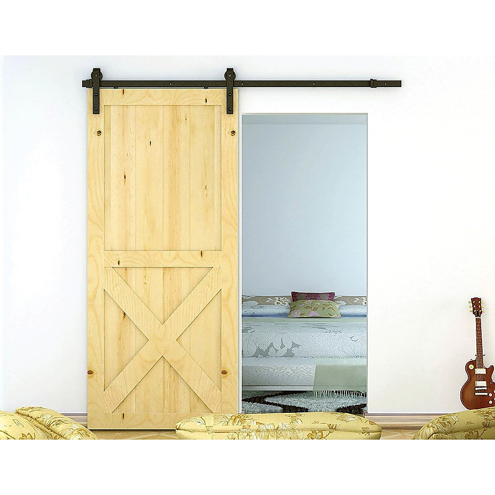 1.8m heavy-duty sliding barn door hardware kit featuring black industrial-grade metal components for rustic home decor.
