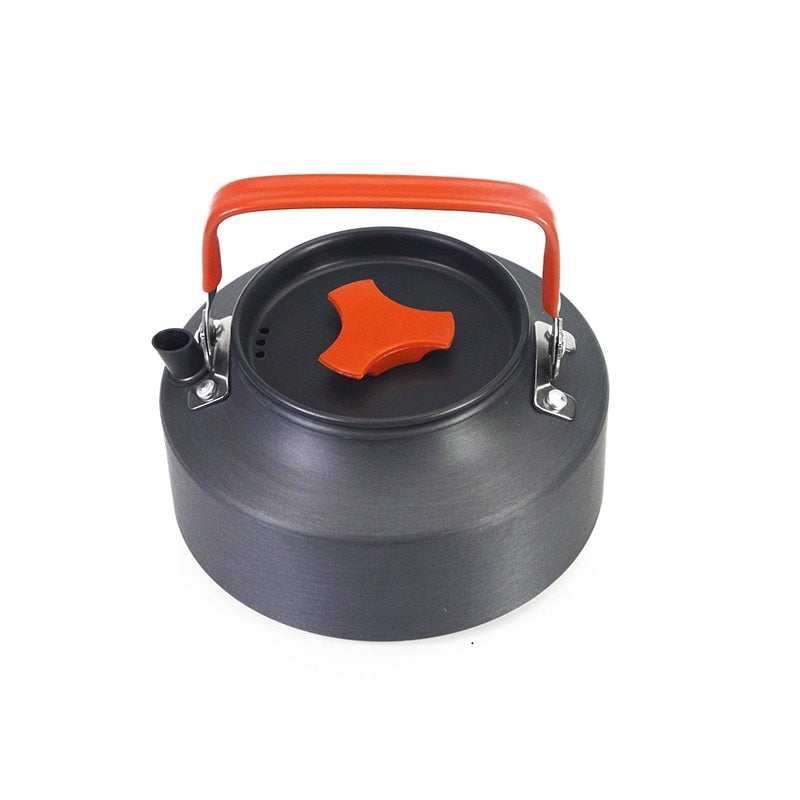 1.1L Camping Water Kettle made of aluminium alloy, perfect for outdoor coffee and cooking, shown in a natural setting.