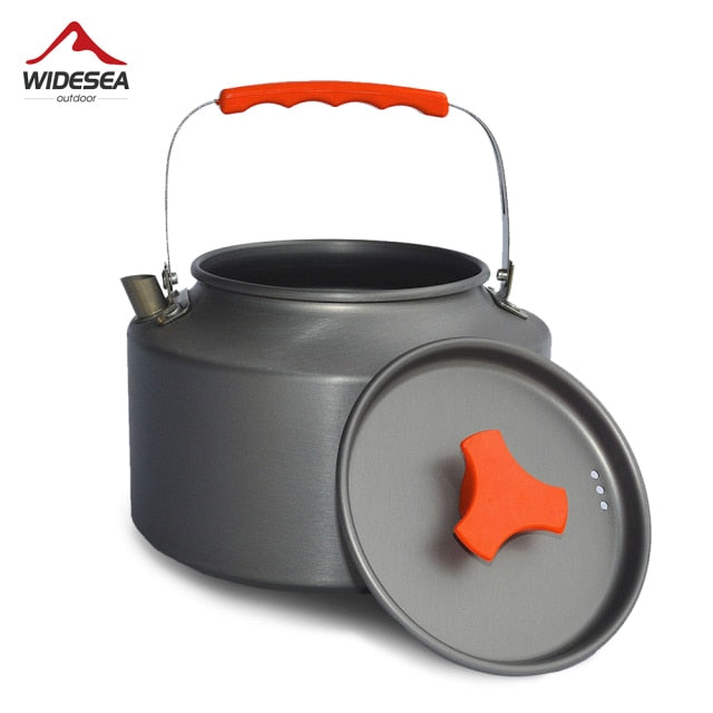 1.1L Camping Water Kettle made of aluminium alloy, perfect for outdoor coffee and cooking, shown in a natural setting.