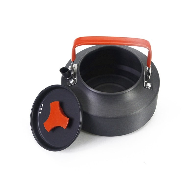 1.1L Camping Water Kettle made of aluminium alloy, perfect for outdoor coffee and cooking, shown in a natural setting.