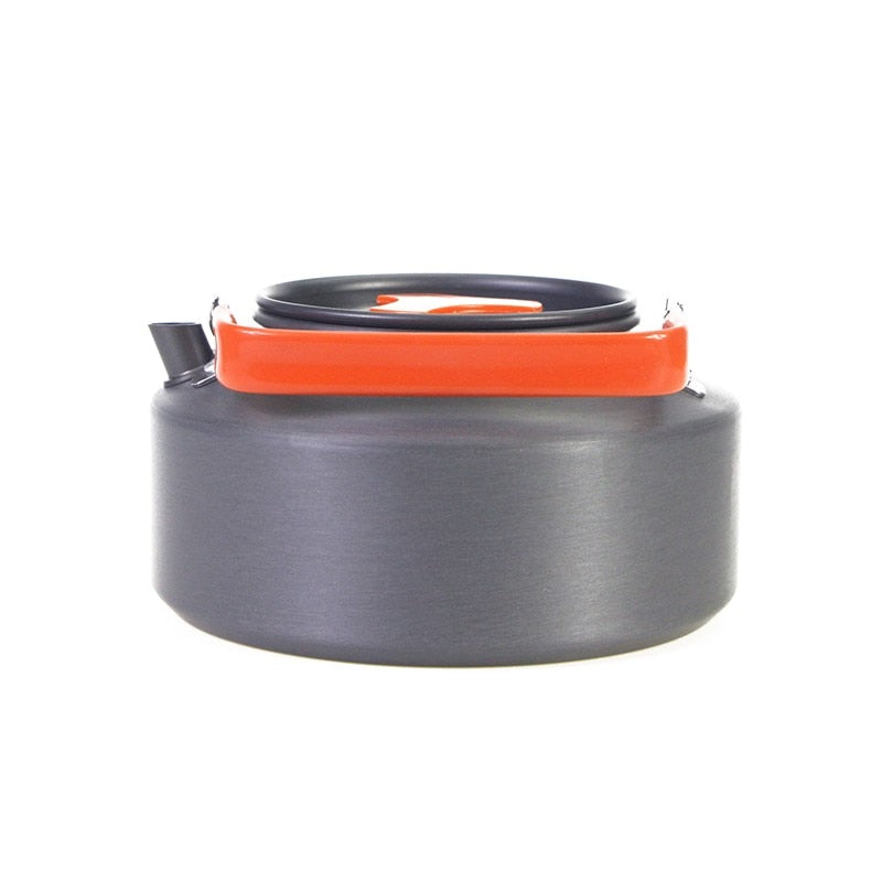 1.1L Camping Water Kettle made of aluminium alloy, perfect for outdoor coffee and cooking, shown in a natural setting.