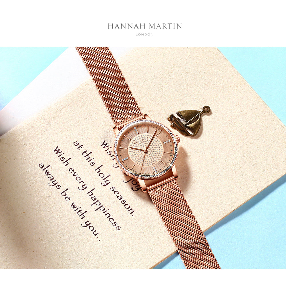 A luxurious women's bracelet watch featuring rhinestones and a quartz movement, elegantly designed with a brass case and stainless steel band.