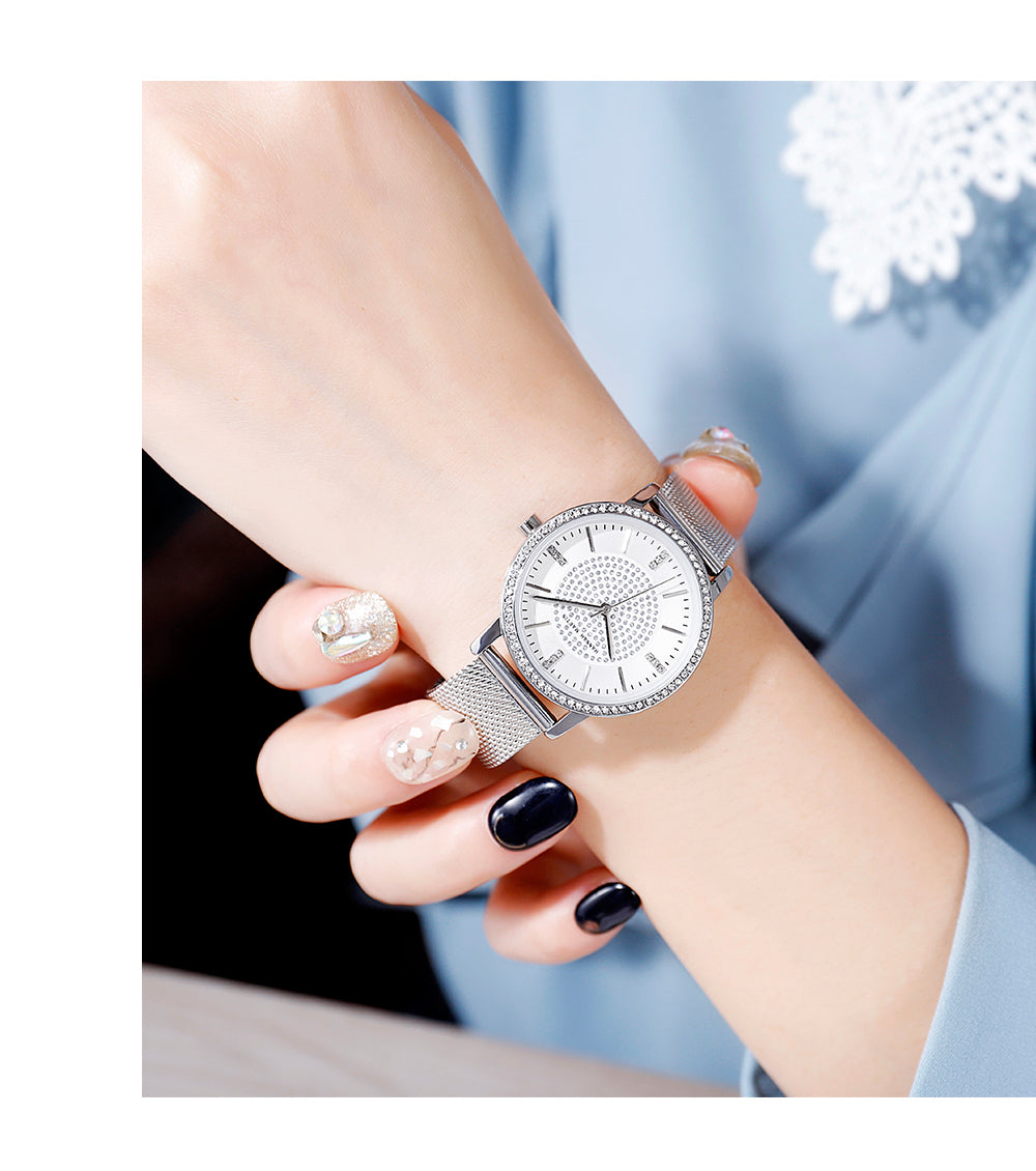 A luxurious women's bracelet watch featuring rhinestones and a quartz movement, elegantly designed with a brass case and stainless steel band.