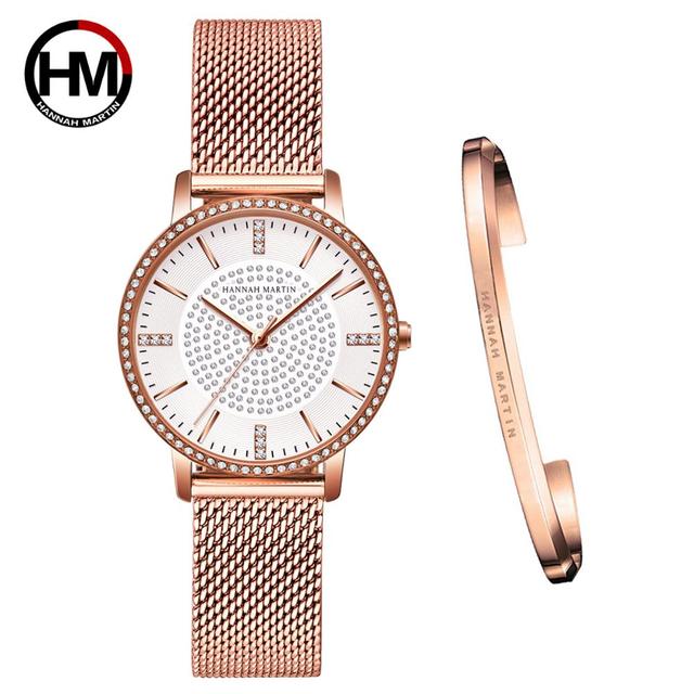 A luxurious women's bracelet watch featuring rhinestones and a quartz movement, elegantly designed with a brass case and stainless steel band.