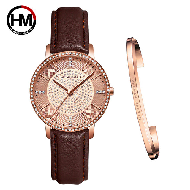 A luxurious women's bracelet watch featuring rhinestones and a quartz movement, elegantly designed with a brass case and stainless steel band.