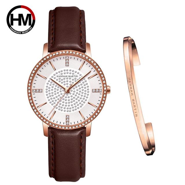 A luxurious women's bracelet watch featuring rhinestones and a quartz movement, elegantly designed with a brass case and stainless steel band.