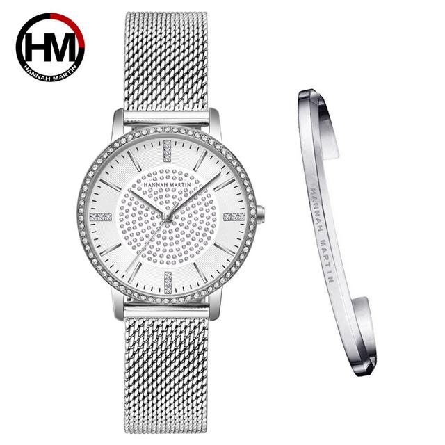 A luxurious women's bracelet watch featuring rhinestones and a quartz movement, elegantly designed with a brass case and stainless steel band.