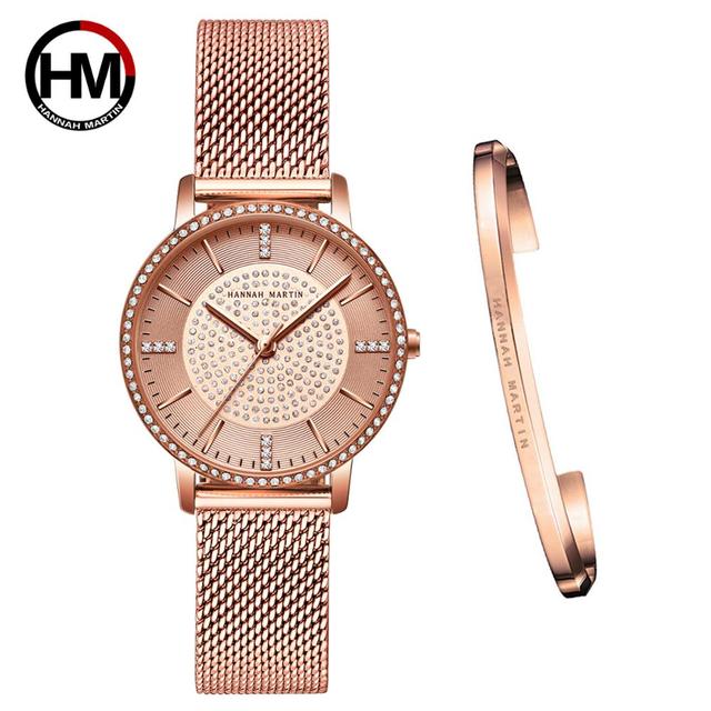 A luxurious women's bracelet watch featuring rhinestones and a quartz movement, elegantly designed with a brass case and stainless steel band.