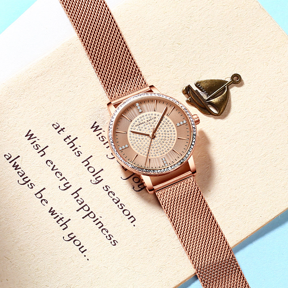 A luxurious women's bracelet watch featuring rhinestones and a quartz movement, elegantly designed with a brass case and stainless steel band.