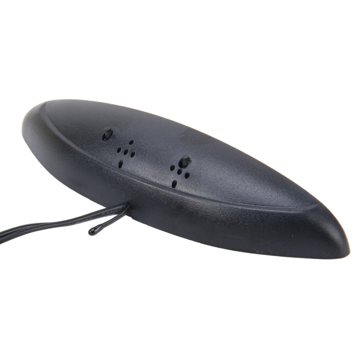 Green 2 in 1 Car LED Digital Display Thermometer Clock mounted on a car vent, showcasing its sleek design and digital display.