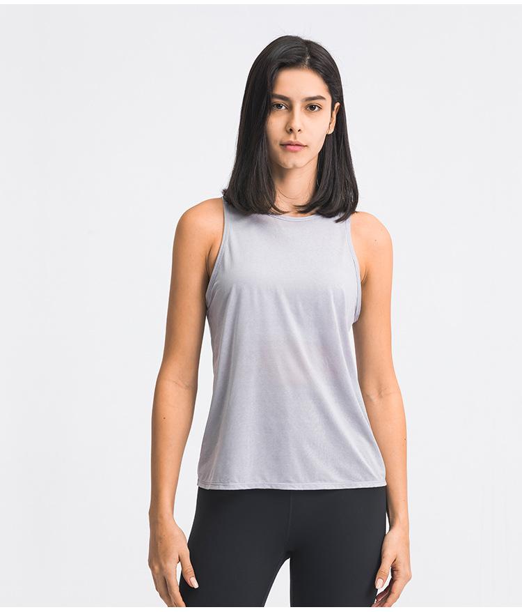 A stylish 2 in 1 loose U-back workout gym tank top for women, featuring a built-in bra, made from lightweight and breathable fabric, perfect for fitness activities.