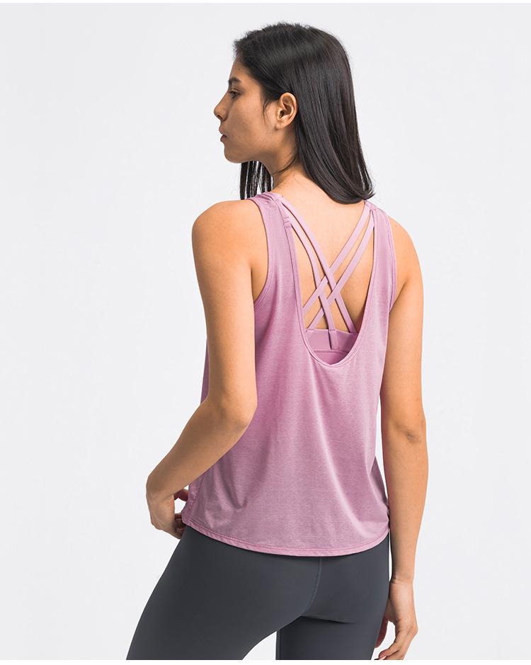 A stylish 2 in 1 loose U-back workout gym tank top for women, featuring a built-in bra, made from lightweight and breathable fabric, perfect for fitness activities.