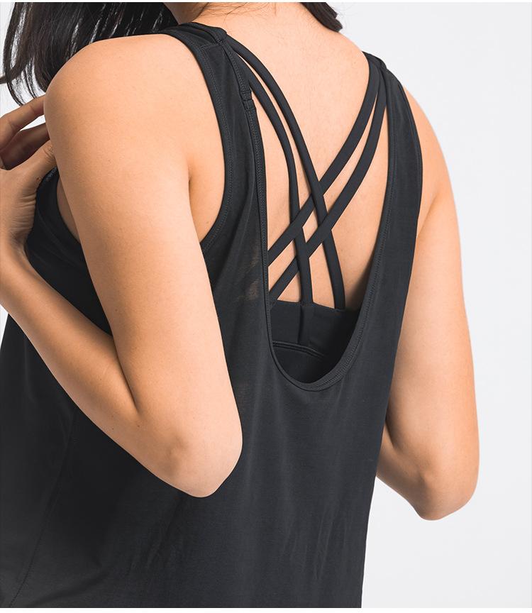 A stylish 2 in 1 loose U-back workout gym tank top for women, featuring a built-in bra, made from lightweight and breathable fabric, perfect for fitness activities.