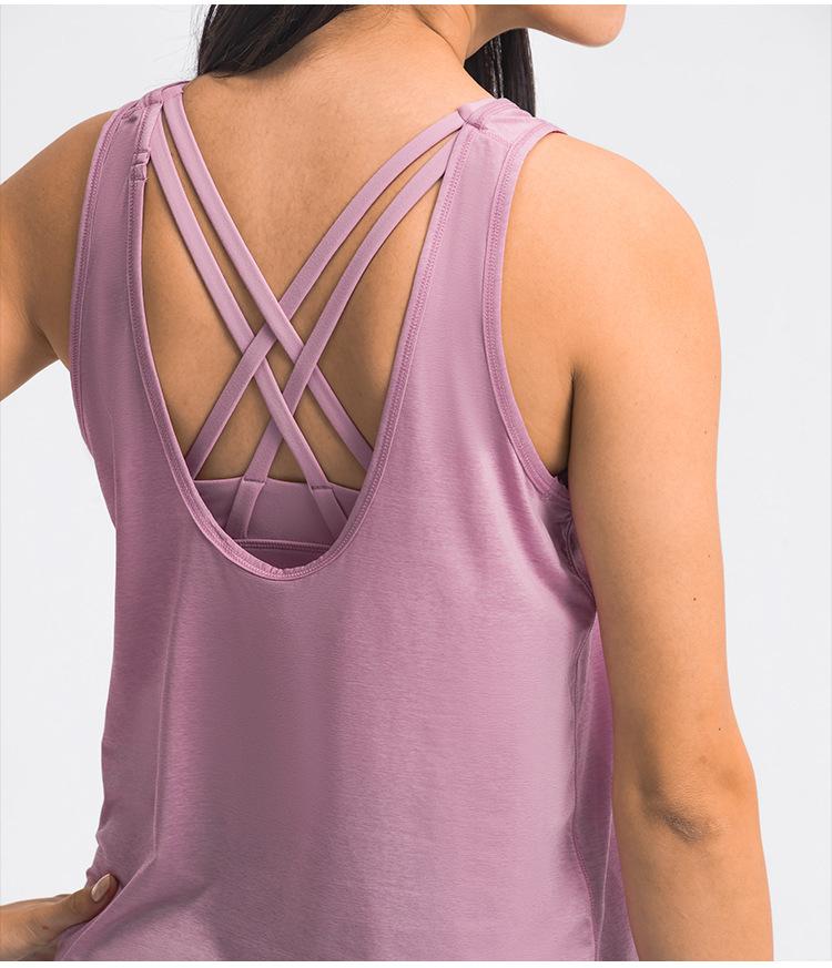 A stylish 2 in 1 loose U-back workout gym tank top for women, featuring a built-in bra, made from lightweight and breathable fabric, perfect for fitness activities.