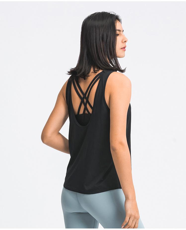 A stylish 2 in 1 loose U-back workout gym tank top for women, featuring a built-in bra, made from lightweight and breathable fabric, perfect for fitness activities.