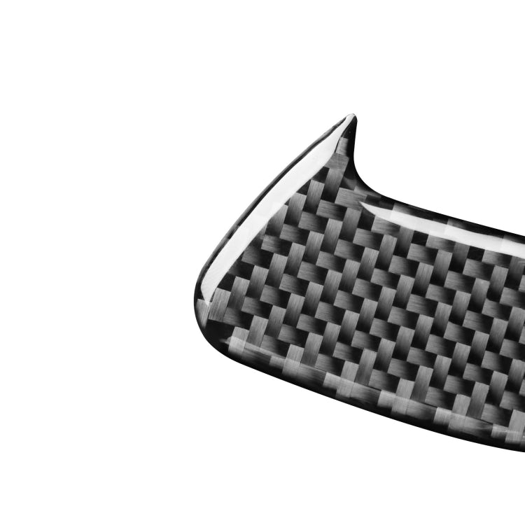 Two carbon fiber decorative stickers for car door locks, showcasing a sleek design and lightweight material.