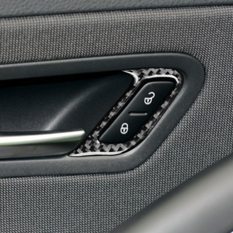Two carbon fiber decorative stickers for car door locks, showcasing a sleek design and lightweight material.