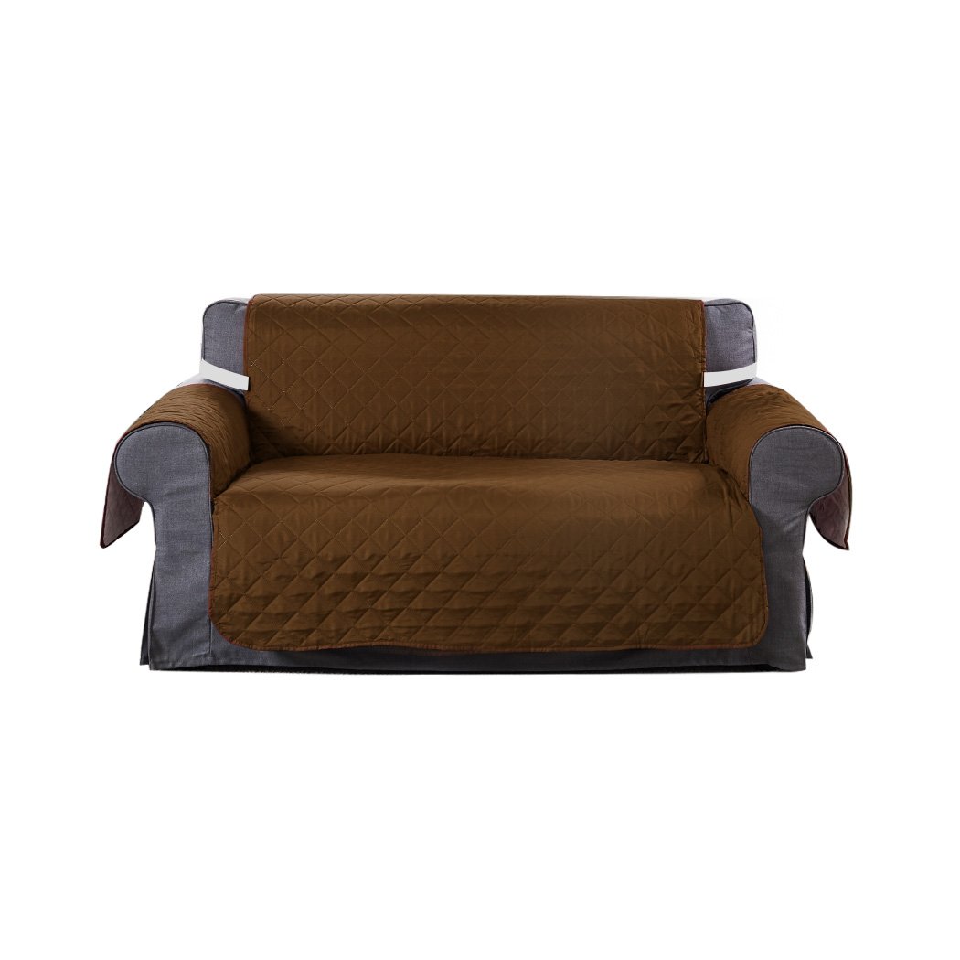 Brown quilted 2 seater sofa cover with microfiber filling, showcasing its anti-slip base and well-stitched edges.