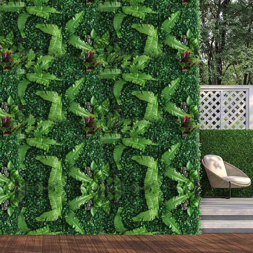 Two pieces of artificial hedge grass plants designed for vertical garden use, showcasing vibrant green leaves and a realistic appearance.