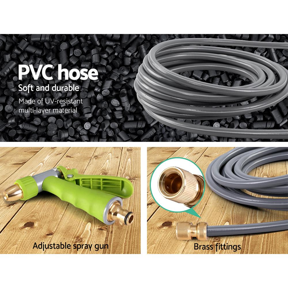 20M Retractable Water Hose Reel with grey casing, mounted on a wall, featuring a brass spray gun and a neatly coiled hose.