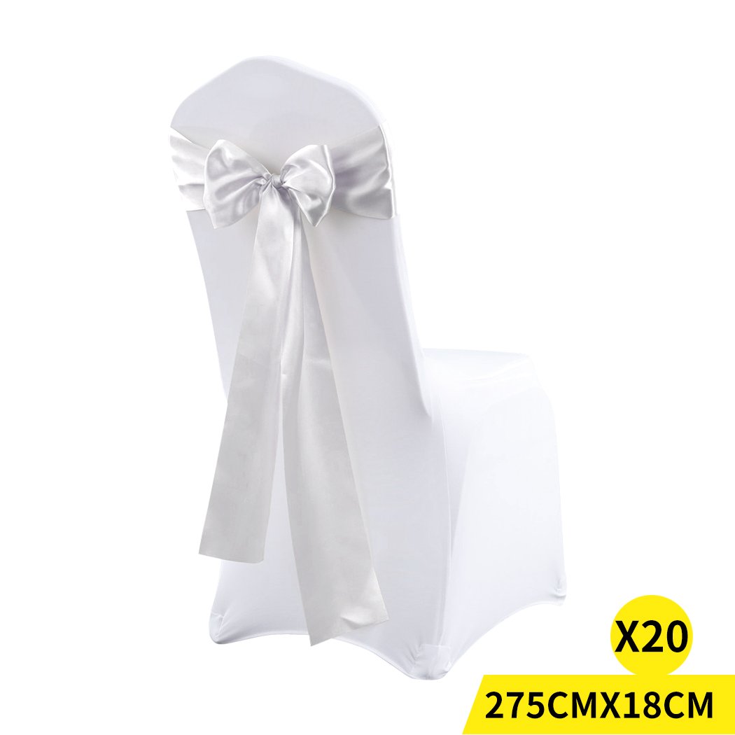 20 satin chair sashes in various colors elegantly draped over chairs, perfect for weddings and events.